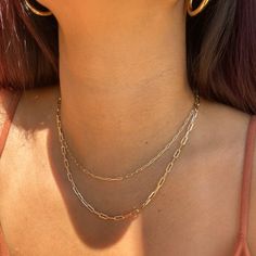 Introducing the Reema necklace – the perfect dainty and delicate piece for your layered necklace look. This necklace features a mini paperclip link chain design with an adjustable length so you can change it up each and every day. Simplicity and daintiness at its best with the Reema necklace! • Single Paperclip Chain• 18k Gold Filled• Chain Length: 18" + 1" extender (to make adjustable)• Link Chain Width: 1.8mm Trendy Layered Figaro Chain Necklace, Trendy Gold Layered Necklace With Paperclip Chain, Minimalist Chain Link Layered Necklace, Minimalist Double Chain Paperclip Jewelry, Minimalist Paperclip Necklace With Double Chain, Minimalist Everyday Layered Link Necklace, Trendy Everyday Layered Figaro Chain Necklace, Trendy Everyday Layered Necklace With Figaro Chain, Minimalist Link Layered Necklace For Everyday