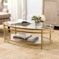 a living room with a coffee table and chairs