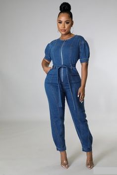 Always Sexy in Designs In VOGUE! This denim jumpsuit is botch classy and sexy. Pair with heels for a night out or combat boots for a casual look. Denim Jumpsuit Zip Closure Waist Tie Stretch Puff Sleeve Model is wearing size small Jean Jumpsuit Outfit, Jumpsuit Outfit Fall, Denim Jumpsuit Outfit, Womens Denim Jumpsuit, Stretch Jumpsuit, Balloon Pants, Jumpsuit Outfit, Denim Joggers, Jumpsuits And Romper