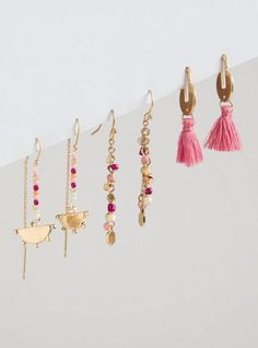 FIT 0. 6” x 1. 8”. MATERIALS + CARE Base metal and charms. Imported. DETAILS High shine finish. . Multi fringe drop. . Set of 3 pairs. The best plus size women's shakey tassel linear earring set earrings sets in gold made of other.