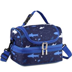 a blue lunch bag with sharks all over it and two zippers on the side