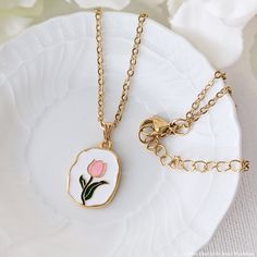 🌷Dainty Tulip Flower Necklace  / Stainless Steel Necklace Chain / Includes Gift Bag / Pink Tulips  100% Brand New This listing is for ONE Tulip Necklace. This dainty Tulip Necklace is great for everyday wear and make great gifts!   📍 Necklace Chain Length: 16" (40cm) + Extension 2"( 5cm)    📍Material:Stainless Steel Necklace Chain, Alloy Enamel Tulip Charms  📍Gift Bag Size:   5 x 7 inch (13 x18 cm) Organdie Bag (random color) ready to give  🌷Matching Earrings : https://4littlebearsworkshop. Cute Necklaces For Spring Gift, Cute Spring Necklace As A Gift, Cute Spring Necklace For Gift, Cute Spring Gift Necklaces, Rose Gold Necklace For Spring Gift, Flower Chain Necklace For Gift, Flower Shaped Chain Necklace For Gift, Feminine Spring Gift Necklaces, Spring Feminine Necklace For Gift