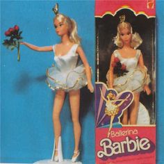 the barbie doll is wearing a white dress