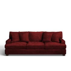 a red couch sitting on top of a white floor