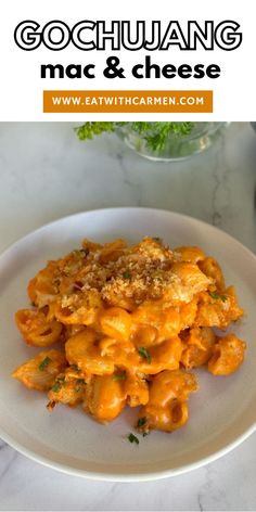 a white plate topped with macaroni and cheese