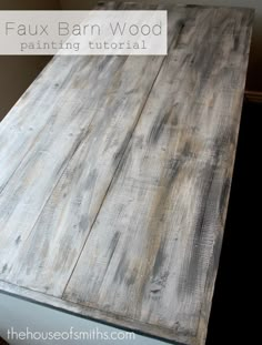 an old wooden table is painted white and has been turned into a dining room table