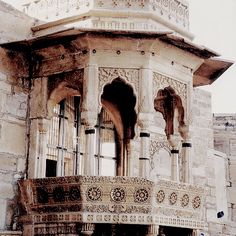 an old building with ornate architecture and arches