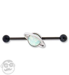 an opalite and black onyxe barbell ring with a white stone in the center