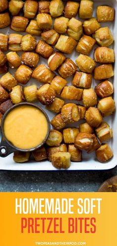 homemade soft pretzel bites in a baking dish with dipping sauce on the side