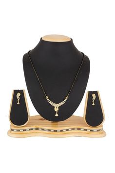 Fashion Jewellery American Diamonds MangalsutraProduct Features :  Color: White and Gold Material: Alloy Mangalsutra Set, Silver Fabric, Stone Studs, American Diamond, Luxor, Fashion Jewellery, Gold Material, Gold And Silver, Necklace Set