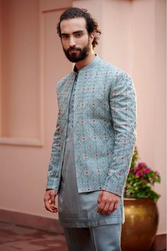 Introducing the new silhouette, Chateau Grey Short Jacket in the Kashmiri Jamawar hand embroidery with Dabka highlighting. Paired with pintuck detailed short kurta and tone tapered on tone trousers. Jatin Malik, India Fashion Men, Indian Wedding Suits Men, Boys Kurta Design, Wedding Kurta For Men, Indian Groom Wear, Wedding Dresses Men Indian