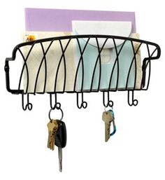 a metal rack holding keys and other items