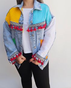 Hello, I'm Vildan Balkanlı. I'm a denim jacket designer based in Turkey, and my designs are meticulously crafted with crochet floral motifs, crystal beads, and embroidery techniques to bring you art pieces designed to bring spring to you. In the fashion world, I aim to highlight women's strong and unique personalities. Each jacket of mine is an original and enchanting design that blends aesthetics with functionality. I create pieces that will elevate and excite women, adding confidence and elega Trendy Multicolor Patchwork Denim Jacket, Bohemian Blue Denim Jacket For Winter, Multicolor Bohemian Cotton Denim Jacket, Multicolor Bohemian Denim Jacket, Bohemian Multicolor Long Sleeve Denim Jacket, Bohemian Patchwork Denim Jacket For Winter, Bohemian Winter Denim Jacket With Patchwork, Multicolor Denim Jacket For Festivals, Festival Multicolor Denim Jacket