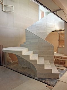 a set of stairs in an unfinished building