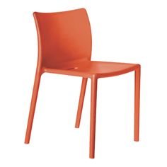 an orange plastic chair on a white background