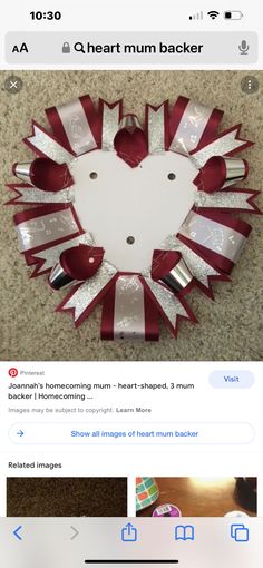 an image of a heart made out of paper and ribbon on the bottom of a facebook post