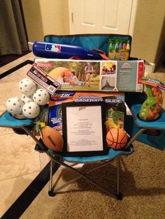 a chair with sports items on it in front of a door and a sign that says,