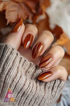 Get ready to embrace the beauty of autumn with our ultimate guide to fall nails! From rich, warm hues like deep burgundy and burnt orange to eye-catching nail art featuring leaves, pumpkins, and cozy patterns, we have everything you need to elevate your manicure this season. Discover trendy techniques such as ombre effects, matte finishes, and glitter accents that perfectly capture the essence of fall. Our easy-to-follow tutorials and expert tips make it simple to achieve stunning looks at home, Autumnal Nails Biab, Spring To Fall Nails, Nails Rust Color, Short Almond Nail Designs Fall, Shiny Fall Nails, Fall Nails For Brown Skin, Fall Nails Multi Colored, Almost Fall Nails, Transitional Fall Nails