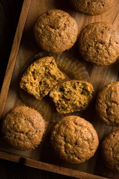 freshly baked muffins on a wooden tray