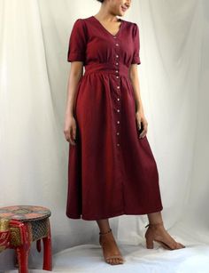 Maroon linen maxi dress, Button down dress, Custom made, Made to order, Plus size-Model height: 5'3" wearing size S-Length: 46"-Fit: Comfortable-100% Cotton-Coconut Buttons**Note: Free Shipping time 15-21 days. Express Shipping time 5-7 days.** Buttoned Midi Length Maxi Dress For Daywear, Linen Midi Dress With Buttons, Casual Short Sleeve Maxi Dress With Button Closure, Linen Button-up Dress With Buttons, Summer Linen Maxi Dress With Button Closure, Linen Maxi Dress With Button Closure For Summer, Fitted Linen Button-up Midi Dress, Linen Button-up Midi Dress, Button-up Linen Midi Dress