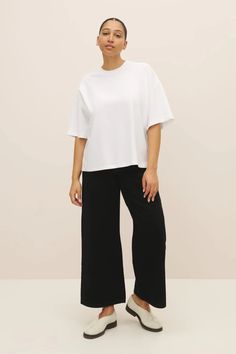 A best seller for a reason, Kowtow's Oversized Boxy Tee is designed for an easy, off the body fit and is finished with a classic crew neckline. Made from heavyweight organic cotton jersey. Made from 100% certified Fair trade heavy-weight organic jersey. Designed for an oversized fit, size down up to two sizes for a closer fit. Sizing: This style is designed for a very oversized fit. We recommend sizing down one to two sizes for a closer fit. Kowtow's model is wearing a size M. Model's measuremen Garment Pattern, Boxy Tee, Garment Labels, For A Reason, Elbow Length Sleeve, Jumper Dress, Body Fit, Best Seller, Sustainable Fashion