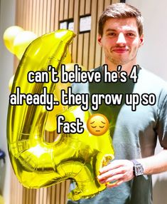 a man holding a yellow balloon that says can't believe he's 4 already they