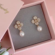 * DETAILS * - High Quality CZ Paved Flower Ear Post Gold Plated Brass Earrings  - Freshwater Baroque Pearls 7-8mm 👉🏻For more earrings, see https://www.etsy.com/shop/JinnysJewelryBySeJin 🎁 These earrings come in a special designer pouch enclosed in a cardboard box. A designer pull drawer pink gift box is available when the gift wrapping option is chosen. 👉🏻Please note that all Jinny's Jewelry pieces are crafted by hand and one-of-a-kind, and may therefore vary slightly in size and shape. --- Elegant Crystal Flower Shape Earrings For Party, Elegant Flower Bridal Earrings For Wedding, Rose Gold Flower Earrings With Pearl Drop For Wedding, Elegant Flower Crystal Earrings For Anniversary, Rose Gold Pearl Drop Flower Earrings For Wedding, Elegant Flower Shaped Crystal Earrings For Formal Occasions, Formal Bridal Earrings With Pearl Drop In Flower Shape, Party Bridal Drop Earrings With Flower Decoration, Elegant Formal Crystal Flower Earrings