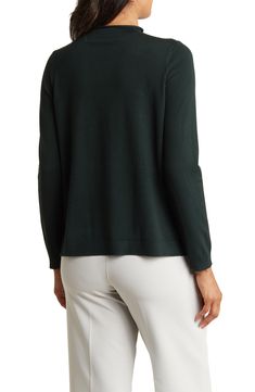 A mock neckline tops a long-sleeve sweater featured in a solid hue for easy, everyday pairing. Mock neck Long sleeves 75% viscose, 25% polyester Machine wash, line dry Imported Model stats: 5'10" height, 32" bust, 25" waist, 36" hip. Model is wearing size Small. Fall Turtleneck With Ribbed Neckline, Elegant Crew Neck Long Sleeve Top For Fall, Solid Mock Neck Top For Layering, Elegant Turtleneck Cardigan For Layering, Spring Funnel Neck Sweater For Layering, Classic Turtleneck Knit Top For Fall, Fall Mock Neck Long Sleeve Top In Fine Knit, Fall Mock Neck Long Sleeve Fine Knit Top, Versatile Solid Mock Neck Top For Fall