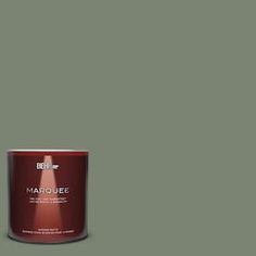 a can of behro's marquee interior paint in dark green