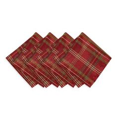 four red and green plaid napkins sitting on top of each other