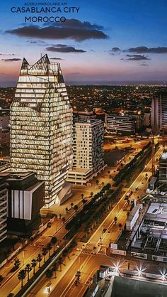 an aerial view of a city at night with the words cassblancacio city on it