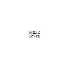 the ocean lover logo is black and white on a white background, with text below it