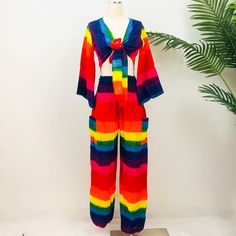 Pride Two Piece Set, Rainbow Unisex Pants, Bell Sleeve Flare Top, LGBTQ + Pride Fashion, Pride Boho Pants, Bright Colorful Festival Fashion  This unique handmade Bright Pride Colorful Pant and Bell Sleeve Top Set is the perfect way to represent your pride. The Rainbow Pride set comes with high-crotch pants and a three-way bell sleeve top to let your creativity shine through. Show your true colors with this amazing set. Handmade Material: Rayon Size: Free Size; Fits Upto US Size Large Adjustable Waist Two Side Pockets Multicolor High Waist Harem Pants For Summer, High Waist Multicolor Harem Pants For Summer, Stretch Multicolor Harem Trousers, Fitted Rainbow Bottoms For Festival, Summer Party Cotton Pants, Fitted Multicolor Sets With Long Pants, Fitted Multicolor Long Pants Sets, Full-length Summer Party Sets, Full Length Summer Party Sets