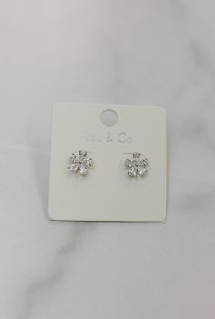 Our delicate Flower Post Studs feature intricately crafted blossoms that add a touch of elegance and femininity to any outfit. These dainty studs are perfect for everyday wear or special occasions, bringing a blooming beauty to your accessory collection. Cubic Zirconia Flower Earrings, Dainty Flower Earrings In Cubic Zirconia, Dainty Flower Earrings With Cubic Zirconia, Dainty Flower Earrings For Formal Events, Silver Feminine Flower Earrings For Formal Occasions, Dainty Flower-shaped Cubic Zirconia Earrings, Silver Feminine Flower Earrings, Elegant Cubic Zirconia Flower Earrings, Classic Wedding Cluster Earrings With Flower Shape