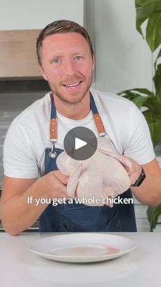 a man in an apron holding a raw chicken on a plate with the words if you get a whole chicken