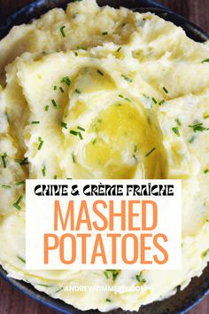 mashed potatoes in a blue bowl with green herbs on top and the title overlay reads, give creme french mashed potatoes