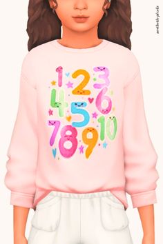 a girl wearing a pink sweatshirt with numbers on it