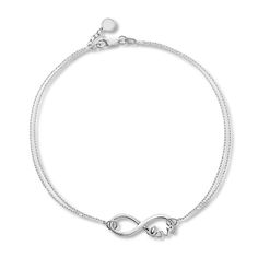 An infinity symbol that nestles the word "Love" is the centerpiece of this contemporary bracelet for her. Crafted of sterling silver, the 7-inch bracelet has cable chains on either side of the center and is secured with a lobster clasp. This bracelet is from the East2West Collection. Infinity Symbol Tattoo, Contemporary Bracelets, Infinity Tattoos, Bracelet For Her, Mother Daughter Tattoos, Celtic Tattoos, Skull Tattoo Design, Infinity Love, White Bracelets