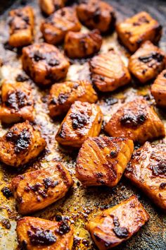 some food that is on a pan and ready to be cooked in the oven for consumption