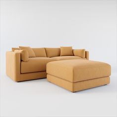 a tan couch and ottoman on a white background