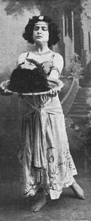 an old black and white photo of a woman holding a tray