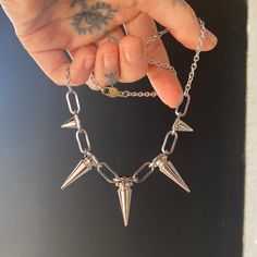 I made this spikey necklace for myself from leftover pieces to the wall hanging collection, and decided to make a few more with whats left. Materials: Stainless steel Length options: 16" or 18" *I'm wearing a 16" length in the second photo. The Mini Spikey Necklaces have only small spikes and come with a 15" chain and toggle clasp. They are limited and ready to ship. Mini Necklace, Toggle Clasp, Steel Jewelry, Arrow Necklace, Two By Two, Chain Necklace, Wall Hanging, Necklaces, Stainless Steel