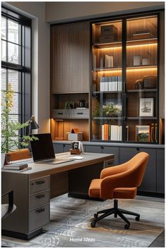 an office with a desk, chair and bookshelf in the middle of it