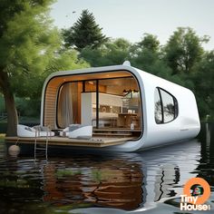 a houseboat floating on top of a body of water