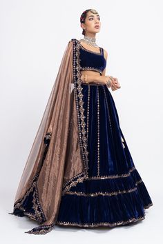 Luxury Royal Blue Lehenga For Diwali, Luxury Royal Blue Anarkali Set For Festive Occasions, Luxury Royal Blue Anarkali Dupatta, Luxury Designer Royal Blue Lehenga, Luxury Blue Semi-stitched Traditional Wear, Luxury Semi-stitched Velvet Choli, Luxury Blue Choli For Eid, Royal Blue Luxury Lehenga, Luxury Royal Blue Lehenga With Dupatta