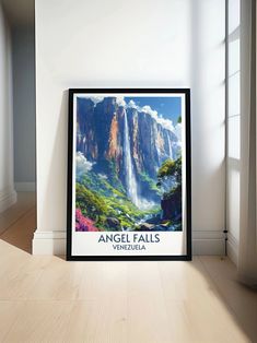 an art print is displayed in front of a window with the words angel falls on it