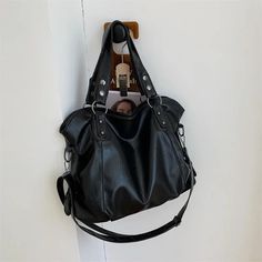 Upgrade your handbag game with our Large Faux Leather Shopper Hobo Shoulder Bag. Spacious design, faux leather material, and versatile style make it perfect for all your daily needs. Stay organized and stylish on-the-go.Material: Faux Leather. Versatile Handheld Faux Leather Shoulder Bag, Black Faux Leather Hobo Shoulder Bag, Large Capacity Faux Leather Satchel Shoulder Bag, Large Capacity Faux Leather Satchel, Trendy Faux Leather Bag For On-the-go, Versatile Faux Leather Shoulder Satchel, Faux Leather Handheld Shoulder Bag For On-the-go, Handheld Faux Leather Shoulder Bag For On-the-go, Faux Leather Satchel With Double Handle For Daily Use