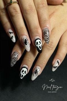 Level up your Halloween look with these ghostly nail designs! 💀🖤 Whether you want cute, spooky, or chic, these ghost nails are hauntingly stylish. 🕷️🎃 #GhostNails #HalloweenMani #SpookyVibes Fall Theme Nails Simple, Halloween Nails White And Black, Halloween Art Nails, Ghost Face Nails Almond, Nail For Halloween, Ghostface Nails Almond, Spooky Halloween Nails Almond, Simple Scream Nails, Scream Mask Nails