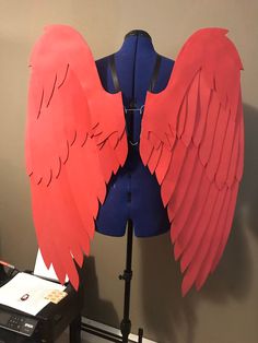 These wings are light weight and easy to wear. Spanning 3 feet, they can be adjusted so you may choose how far from your body they protrude. Made from colored foam, they are bendable while still being able to retain their shape, as well as very durable. This set is made with a shaped wire in the center meant to be placed inside a corset or bra. I can include straps if you'd prefer to wear them that way, just select your color of straps in the drop down menu, either black or white. Customization Folded Wings, Wings Cosplay, Cosplay Wings, Costume Wings, Wings Costume, Cosplay Tips, White Eyes, Diy Costumes, Drawing Reference Poses