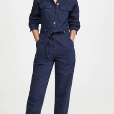 Navy Blue Button Front Boilersuit Style Jumpsuit, Tie Waist Fabric: Non-Stretch Denim Collared Neck And Button At Placket Long Sleeves With Button Cuffs Detachable Belt Slant Hip Pockets, Flap Breast Pockets And One Patch Back Pocket Ankle Length Shell: 100% Cotton Wash Cold Imported, Turkey Style #Refor40127 A Relaxed Reformation Jumpsuit Modeled On Classic Workwear And Crafted From Sturdy Cotton. Heels, Sandals, And Sneakers All Work Equally Well With This One-And-Done Silhouette. Reformation Jumpsuit, Work Jumpsuit, Turkey Style, Classic Workwear, Style Jumpsuit, Boiler Suit, Heels Sandals, Navy Color, Ankle Length